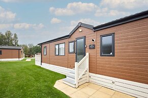 Host Stay Woodpecker Lodge