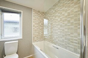Host Stay Woodpecker Lodge
