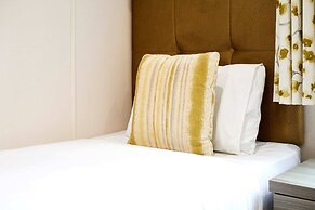 Host Stay Woodpecker Lodge