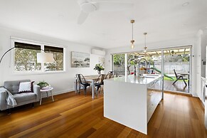Relaxed Bayside Stay With Outdoor Space