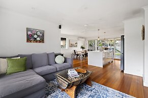 Relaxed Bayside Stay With Outdoor Space