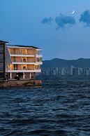 Dali Rushi Jiuxi Sea View Holiday Inn
