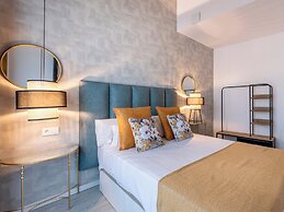Apartamentos Puerta Elvira Suites 3000