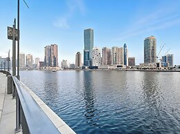 Elegant 3BR Canal & Burj Khalifa Views