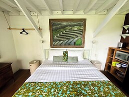 Frame Cabin with Endless Rice Field View