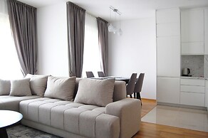 Status Apartments 100