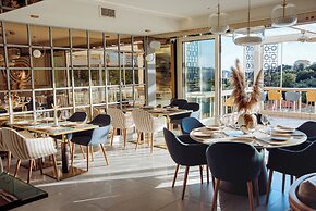 Status Apartments 100