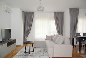 Status Apartments 100