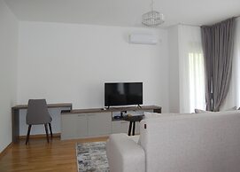 Status Apartments 100