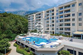 Status Apartments 100