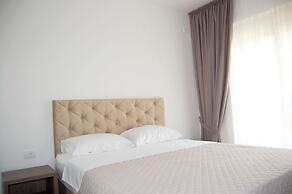 Status Apartments 100