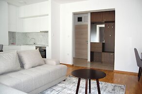 Status Apartments 100