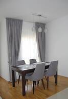 Status Apartments 100
