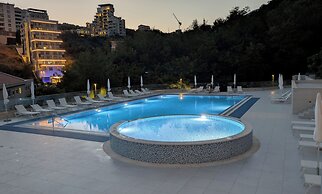 Status Apartments 100