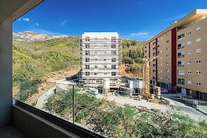 Status Apartments 100