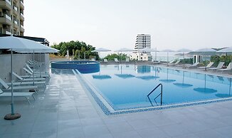 Status Apartments 100