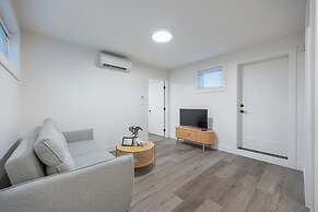 Sunny 1BR Detached Suite