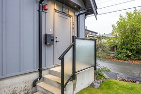 Sunny 1BR Detached Suite