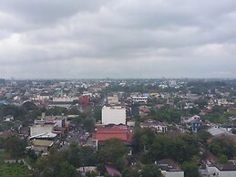 Homey Studio Apartment At Mansyur Residence