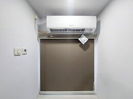 Homey Studio Apartment At Mansyur Residence