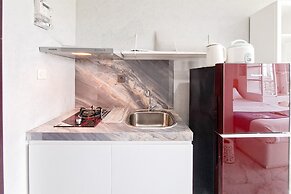 Grey Style Studio At Casa De Parco Apartment