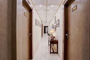 Fabhotel Abrol Suites