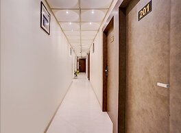 Fabhotel Abrol Suites