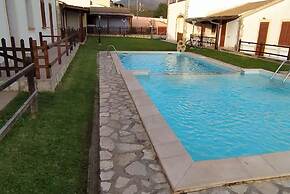 Comfy Sardinian Retreat With Pool Access
