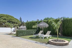 Casa con piscina compartida Conil de 5