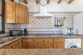 Casa con piscina compartida Conil de 5