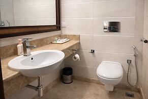 EMBLEM Hotel – Arjun Marg, Golf Course Road Gurgaon