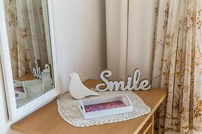 Apartments and Rooms Happiness