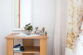 Apartments and Rooms Happiness