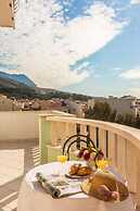 Apartments and Rooms Happiness