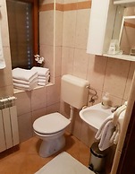Apartments and Room Perstel