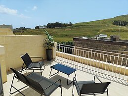 Veduta ta' Pinu Holiday Residences