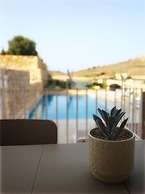 Veduta ta' Pinu Holiday Residences