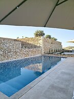 Veduta ta' Pinu Holiday Residences