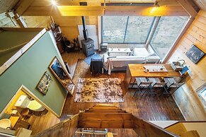Wood Cabin by the River