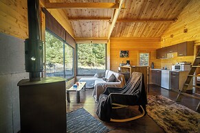 Wood Cabin by the River
