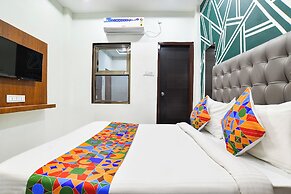 Fabhotel Kamari Inn