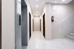 Fabhotel Kamari Inn