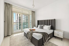 2BR Beachfront Retreat with Palm Views