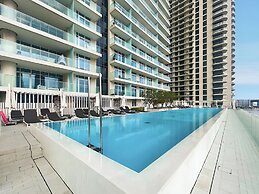 2BR Beachfront Retreat with Palm Views