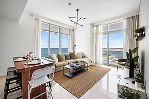 2BR Beachfront Retreat with Palm Views