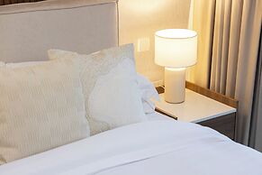 Roomszy Residences - Opera Grand