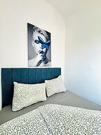 Central 8BR Stay with Garden and Terrace