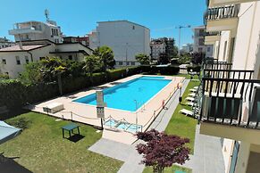 Apartment With Pool Access and Balcony