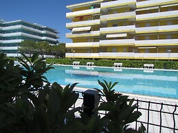 Bright Flat Surrounded by Pools
