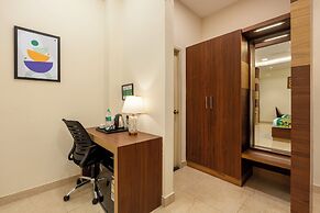 Treebo Premium Pine Tree Courtyard
